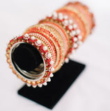 Red, Gold, and Pearl Bangle Set